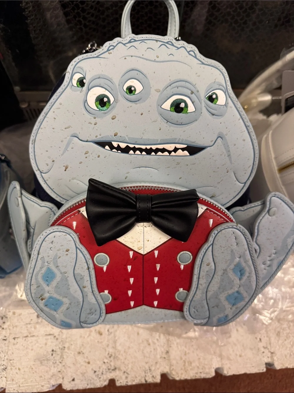 Loungefly Light Blue Multi‑Eye Monster Crossbody with Red Vest and Black Bow